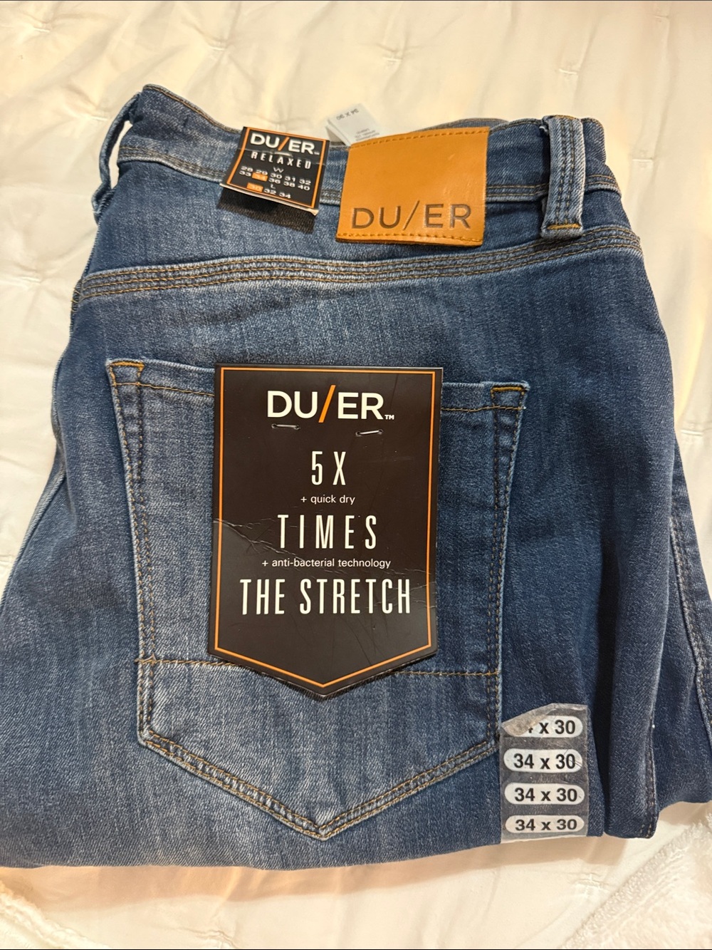 DU/ER Men's Relaxed Stretch Jeans in Indigo Blue